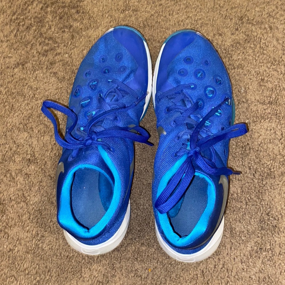 Nike blue basketball shoes.